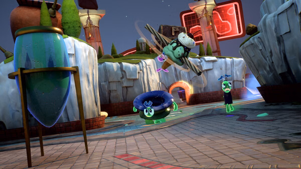 Screenshot from the game Kiln showing colorful clay characters in a whimsical, vibrant arena with floating objects.
