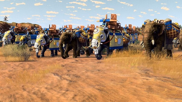 Screenshot from Age of Empires IV: Dynasties of the East showing a formation of war elephants marching across a grassy plain.