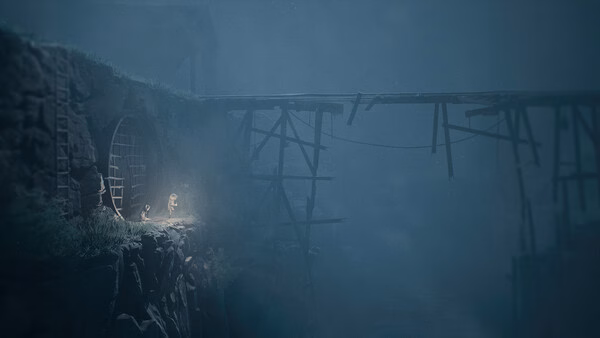 A screenshot from REANIMAL showing two characters near a cave entrance, surrounded by mist and a broken wooden bridge.