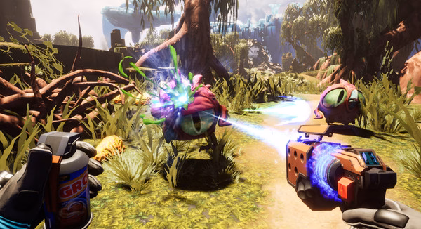 Screenshot from Journey To The Savage Planet showing a player confronting alien creatures in a vibrant, lush environment with a laser weapon.