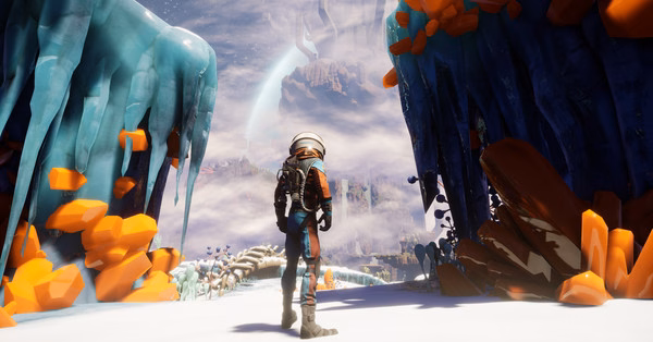 Screenshot from Journey To The Savage Planet showing a suited explorer amid vibrant alien landscapes with icy cliffs and orange crystals.