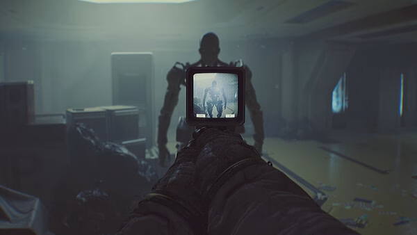 ROUTINE screenshot: A player aims at a humanoid figure through a weapon's scope in a dimly lit, futuristic interior setting.